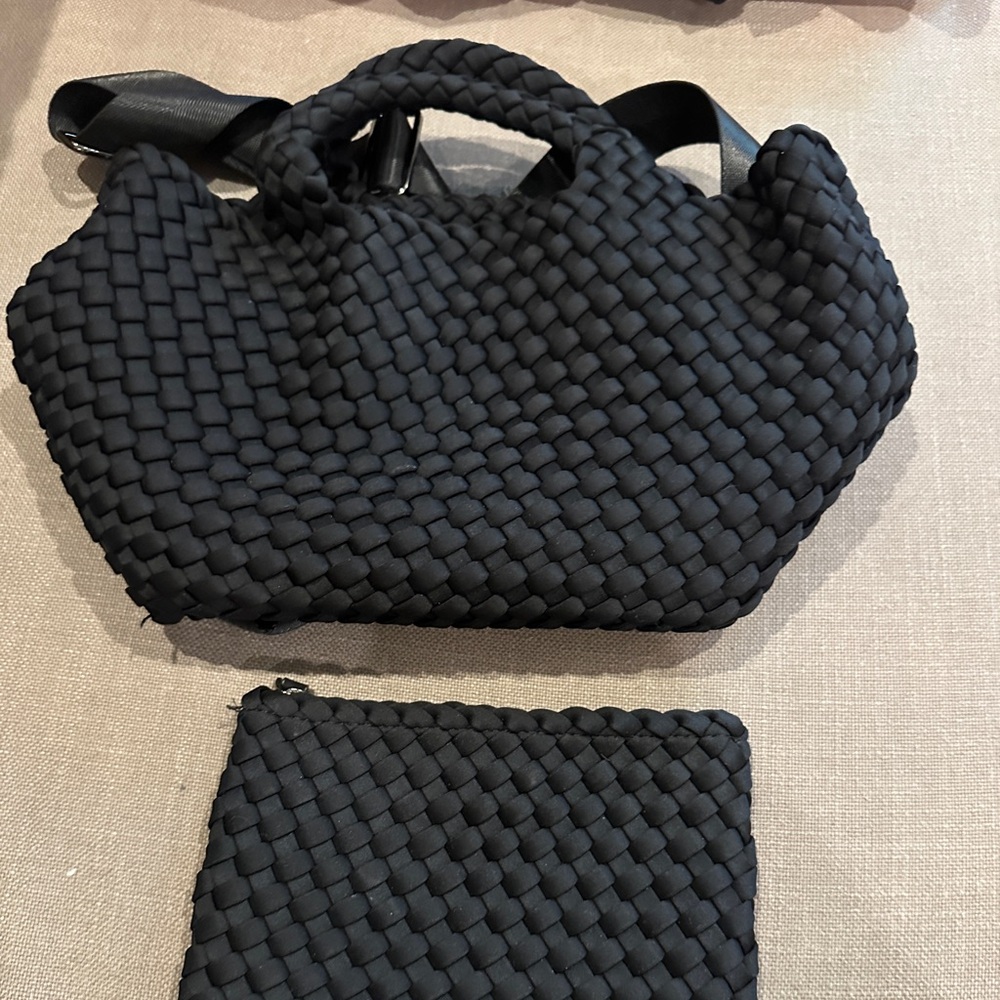 Naghedi black cross body tote with removable strap and matching pouch.